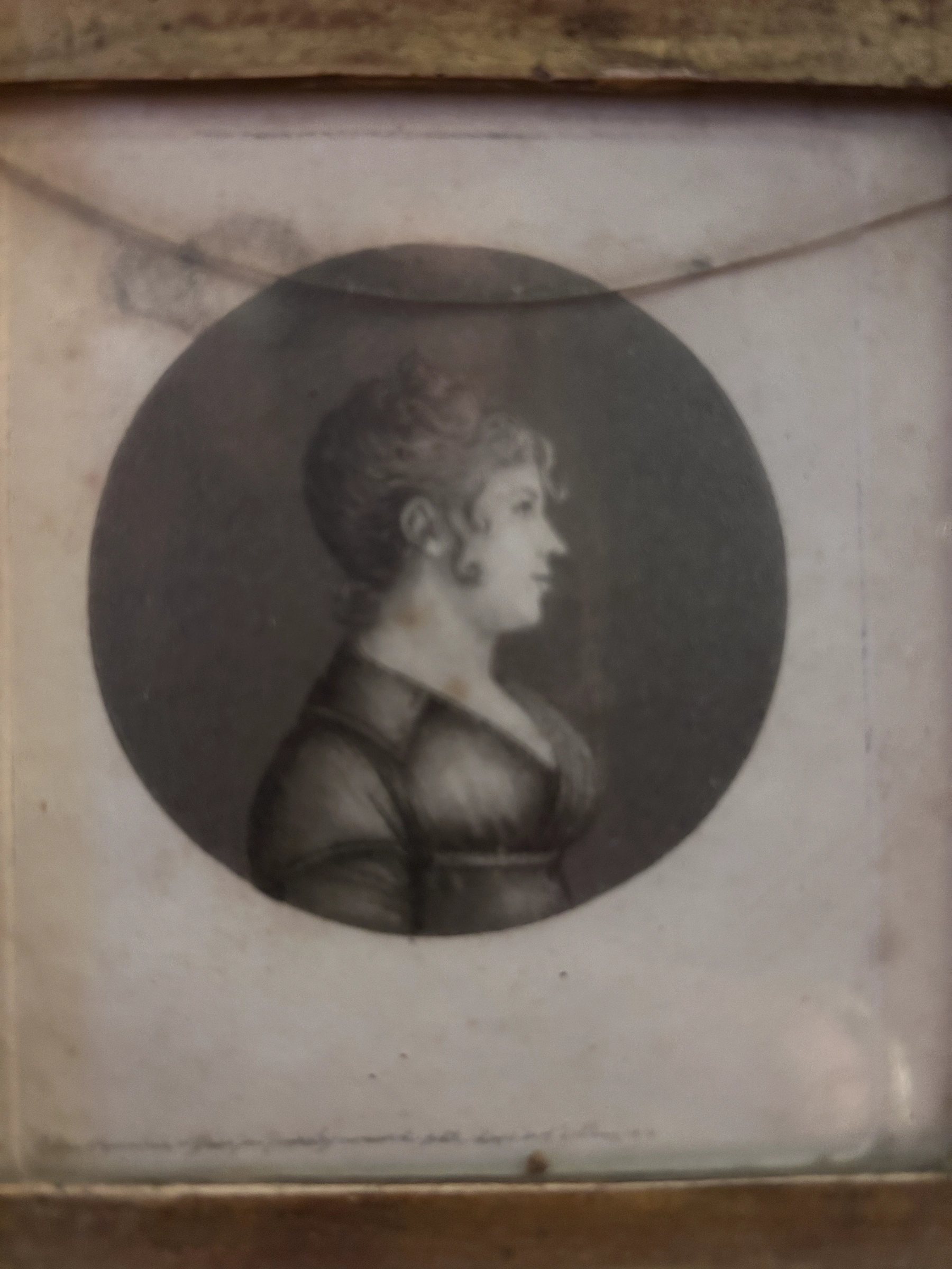 Antique framed engraving of a woman in profile